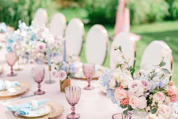 Arrange an outdoor table with beautiful flowers