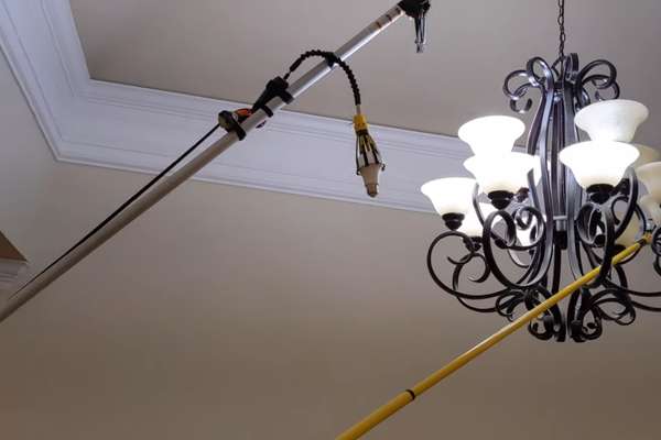 What Items Needed to Change a Light Bulb in a High Chandelier?