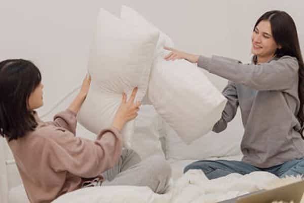 Should You Sleep with Two Pillows or One? It Depends on Your Needs
