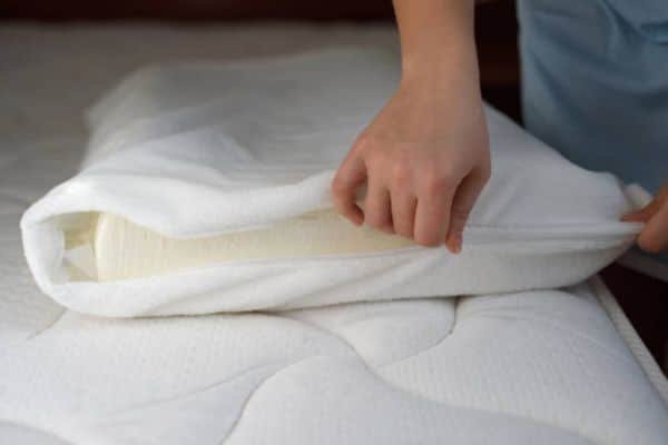 Strip the Bed To Clean A Pillow Top Mattress Topper