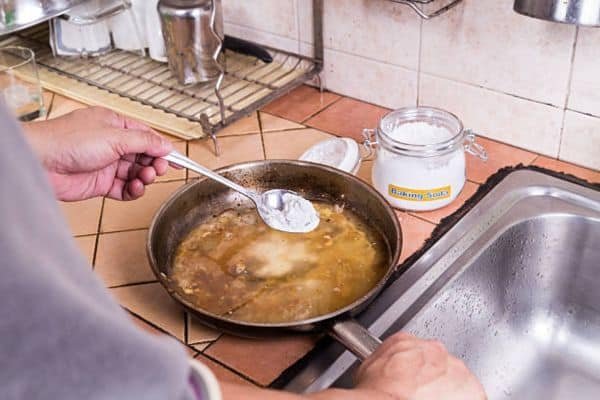 Step 4: Try baking soda paste for stubborn bits