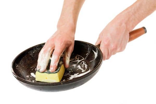 Scrub Away the Rust To Fix Rusty Cast Iron Pan