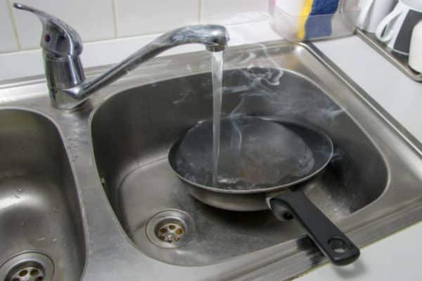 Boil Water in the Pan to Clean Baked-On Grease from Stainless Steel Pan