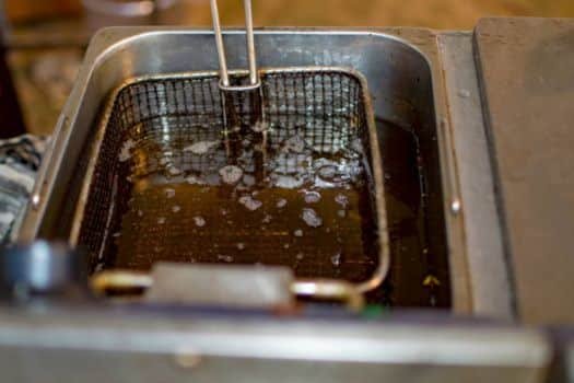 Unplug and Cool Down to Clean Stuck-On Grease from Deep Fryer