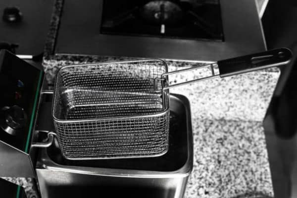 Unplug and Cool the Fryer to Clean a Deep Fryer with Vinegar 